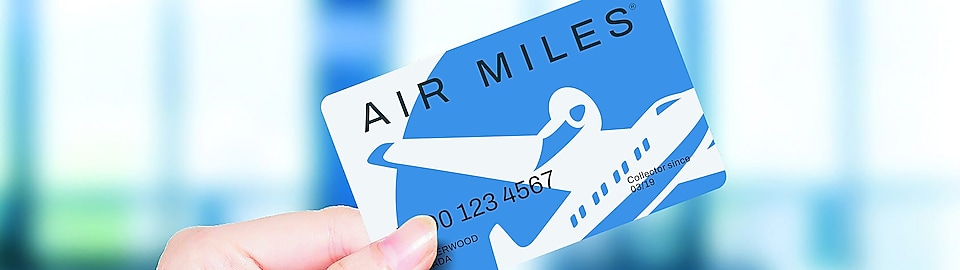 airmiles card hand holding