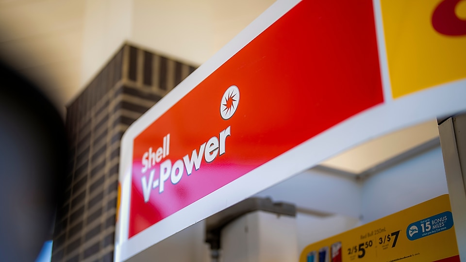 The top of a Fuel pump, it says Shell V-Power® in white on a red background.